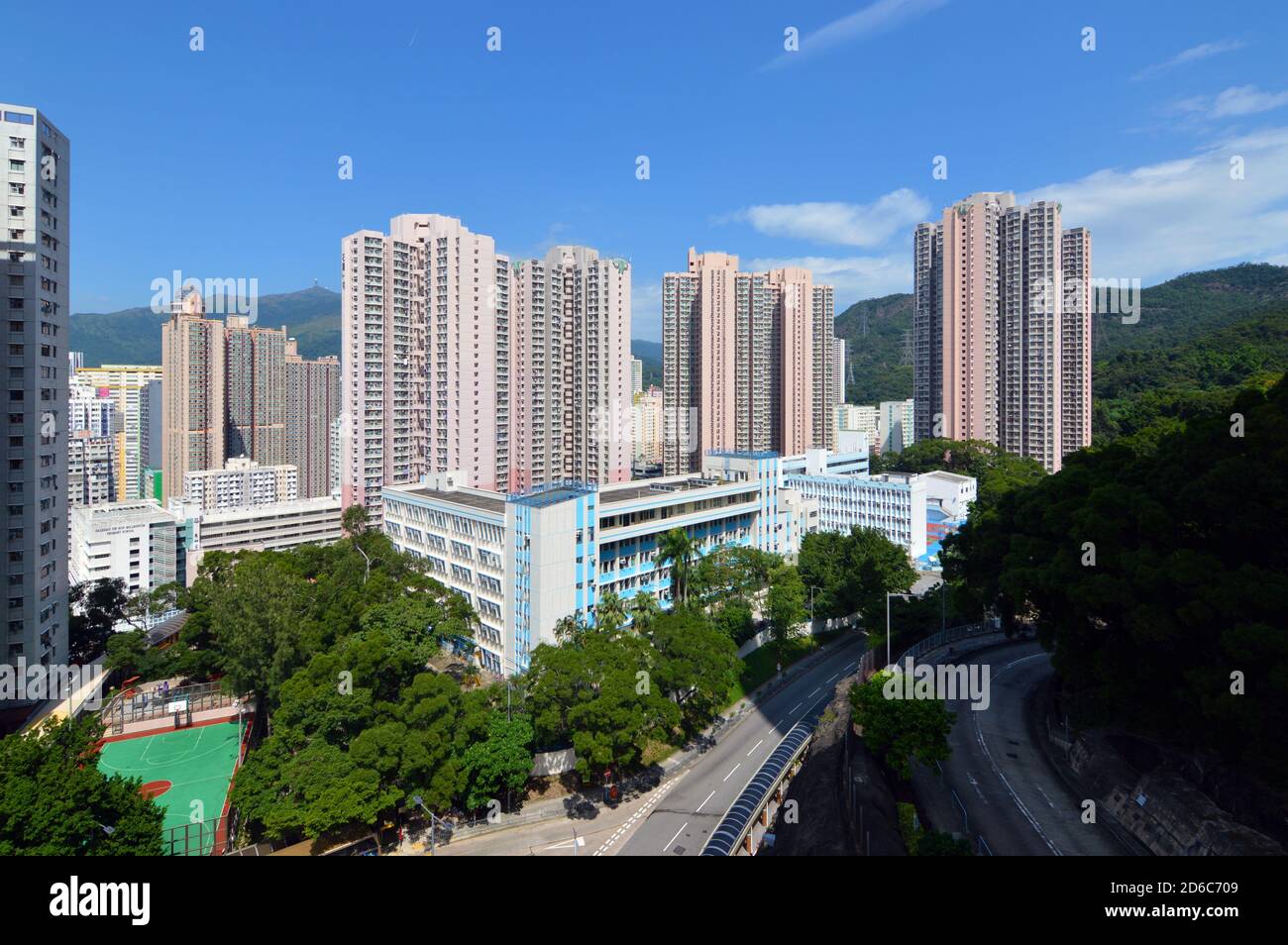 Schools and housing in Hong Kong – Pope Paul VI College, CNEC Christian College, Shek Lei (II) Estate, Kwai Chung Stock Photo