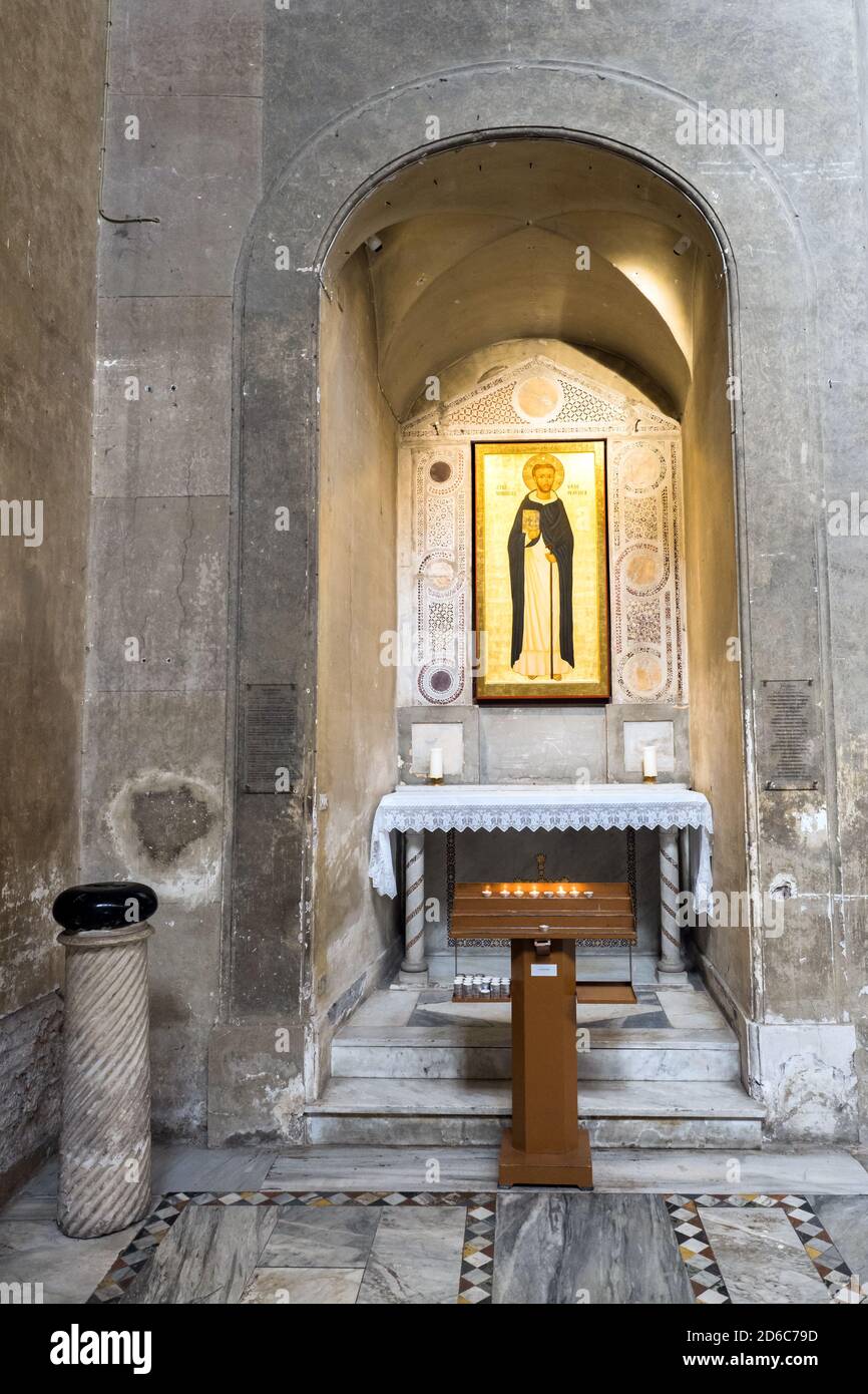 Lapis diaboli (Devil's stone) and the altar of Saint Dominic (Santo domenico) in the Basilica of Santa Sabina on the Aventine hill - Rome, Italy Stock Photo