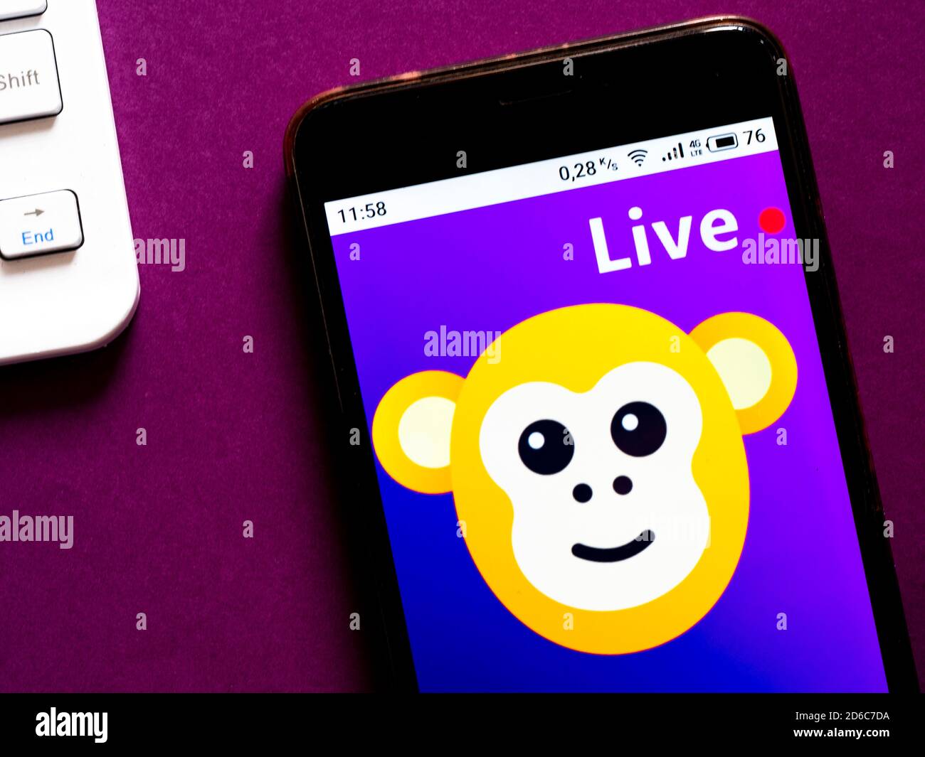 In this photo illustration a Monkey Video Chat - Live Chat appliance by 玉霞 杨 logo is seen displayed on a smartphone Stock Photo