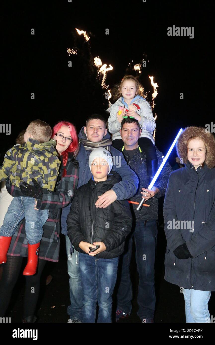 People enjoying bonfire night fireworks at Ayr racecourse. The event was organised as part of a chairty fund raising effort . Stock Photo
