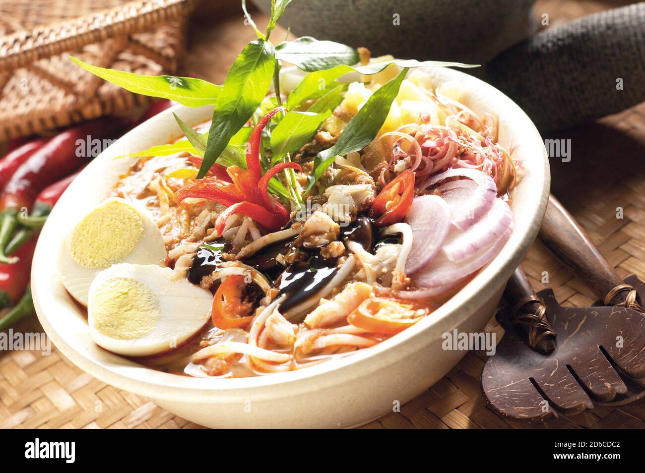 Asam Laksa, a flavorful, tangy and spicy Malaysian fish based rice noodle soup Stock Photo