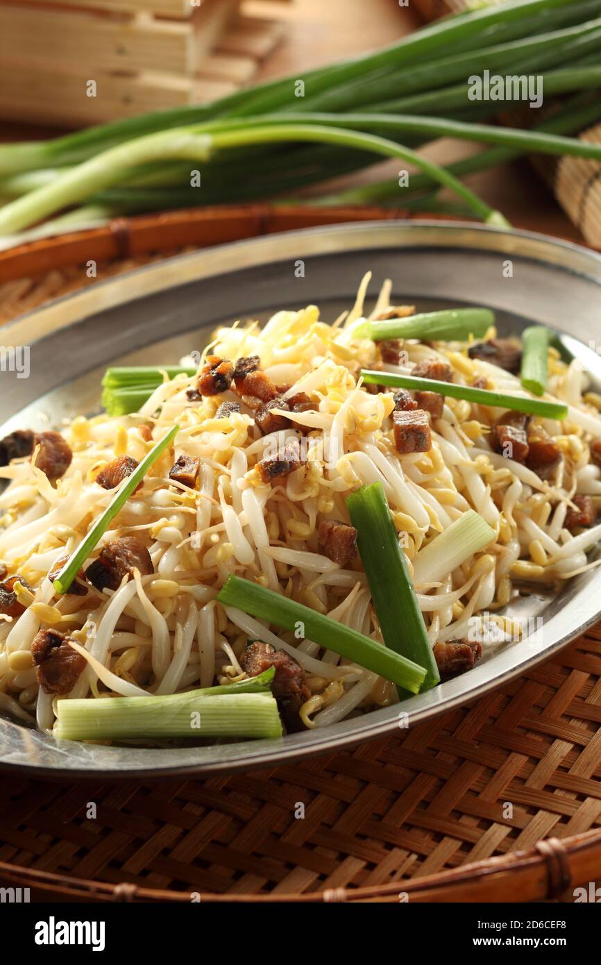 Stirfried bean sprouts with salted fish Stock Photo Alamy