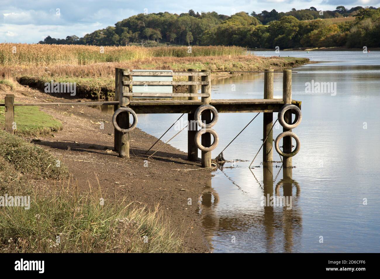 Wooden Jetty or landing stage at Hackney Marsh on the River Teign Devon. This jetty is close to the Passage House Inn and local Nature Reserve. Stock Photo