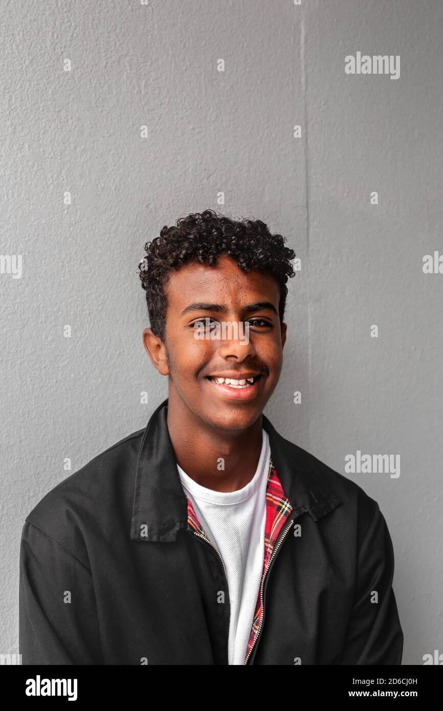 Portrait young curly man smiling hi-res stock photography and images ...