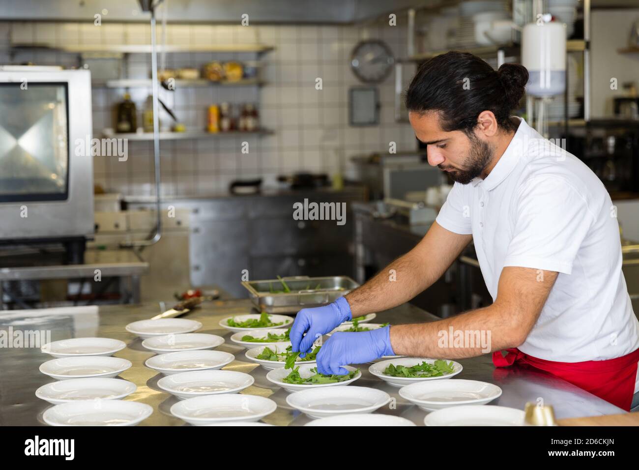 Chef working in kitchen Stock Photo - Alamy