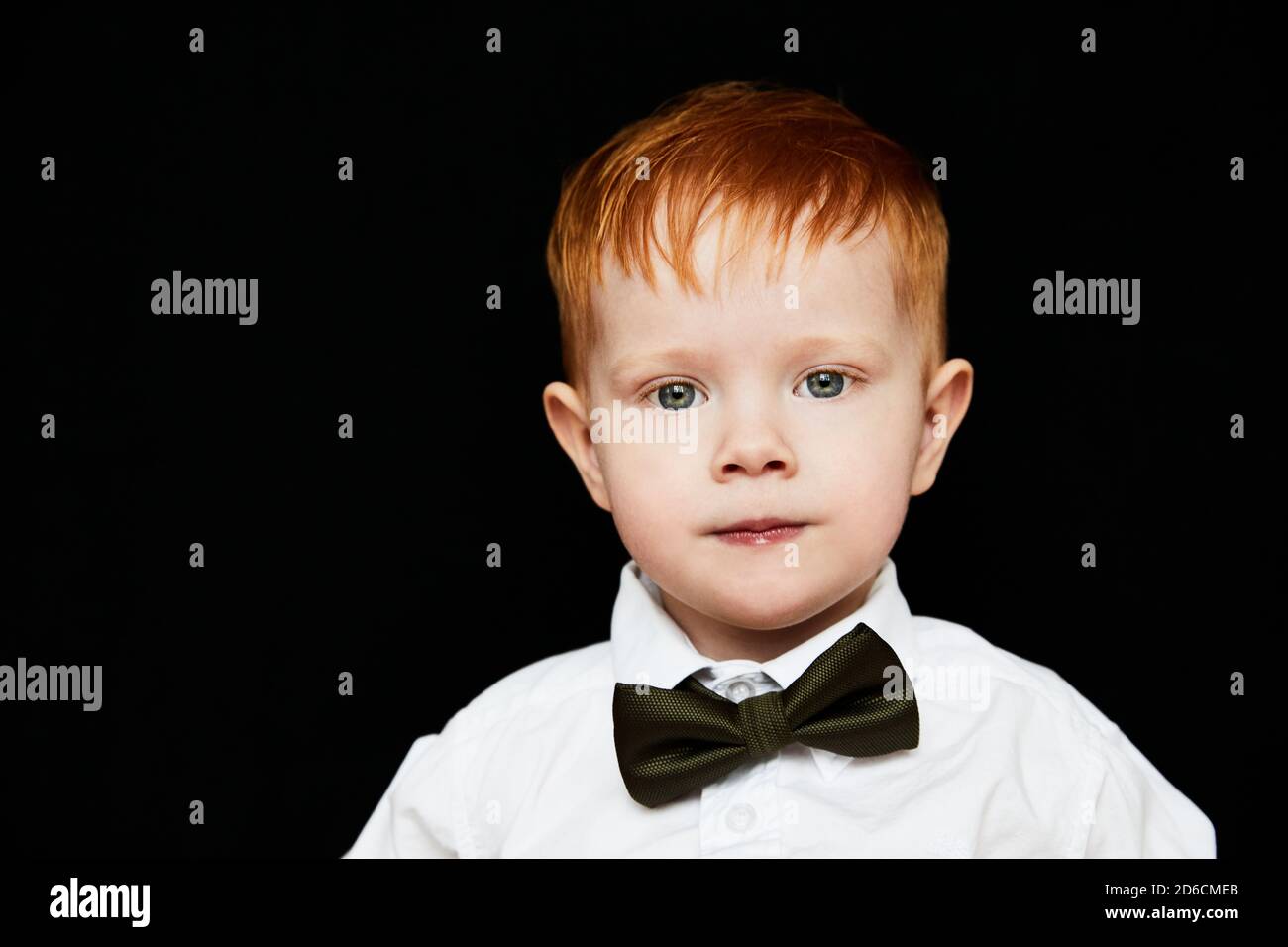 Boy wearing bow tie hi-res stock photography and images - Alamy