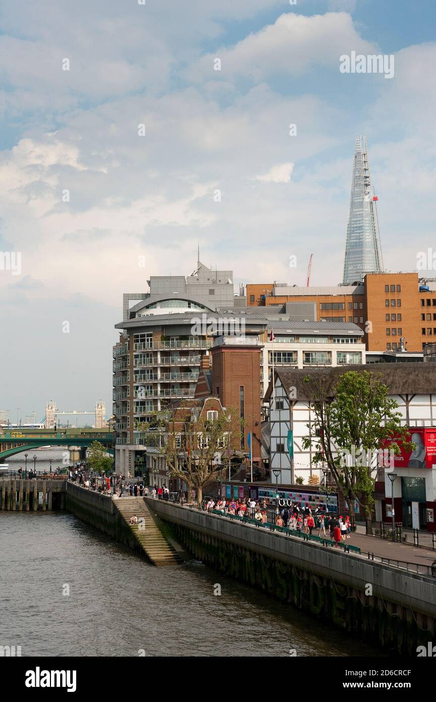 River Thames with Shakespeare's Globe Theatre, The Shard and Tower Bridge in the background, London, England. Stock Photo