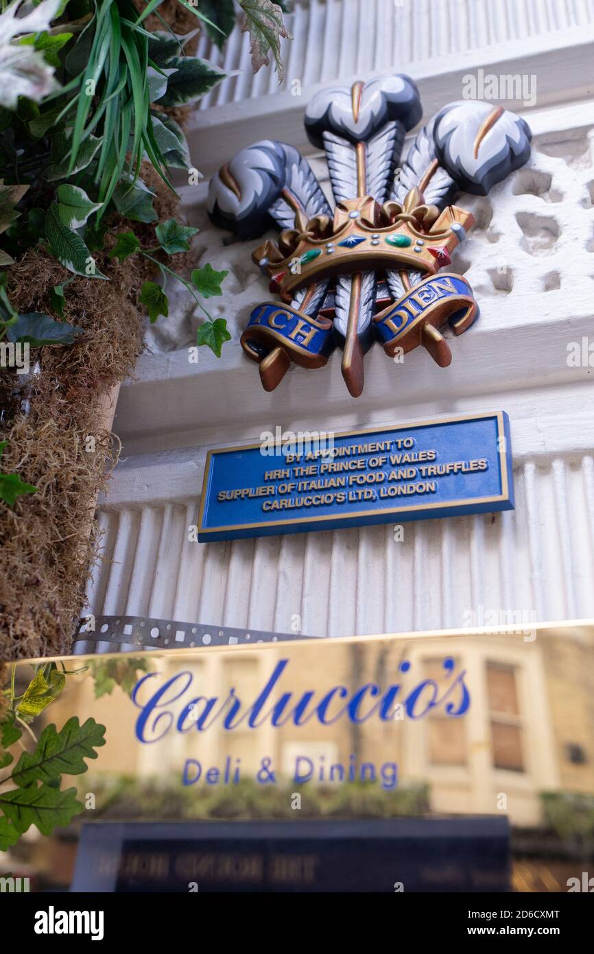 The Prince of Wales Royal Warrant is still on display outside the building that used to house the Carluccio’s Deli and Dining restaurant business in C Stock Photo