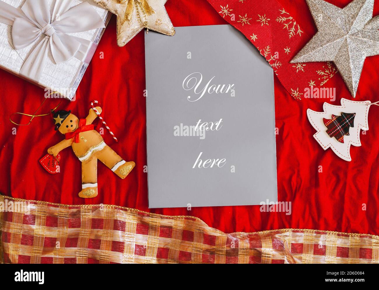 Mockup of Christmas invitation with decorations. Stock Photo