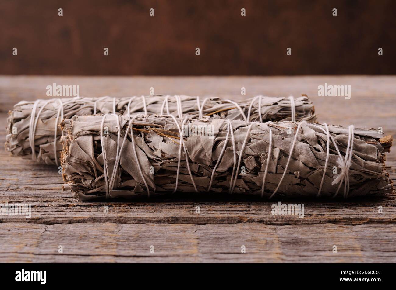 Smudge bundle  dried white sage. Balancing the soul. Herbal, meditation.Image in horizontal orientation and selective focus. Stock Photo