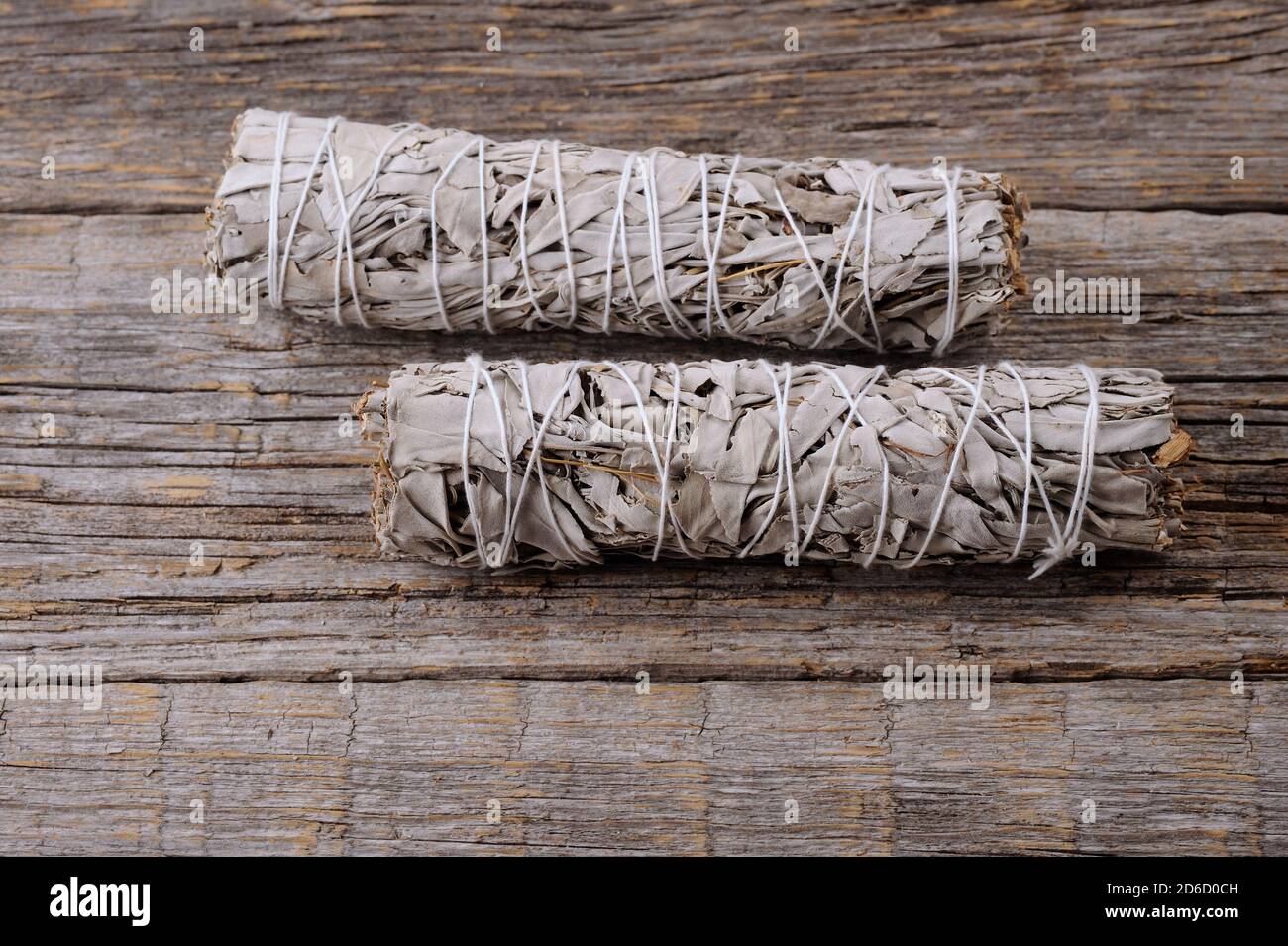 White sage smudge sticks  for ritual practice healing the soul.Close up with space for text.Selective focus. Stock Photo