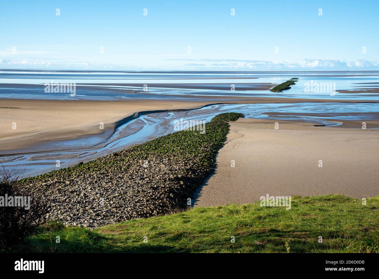The remains of Walduck's Wall, Jenny Brown's Point, Silverdale, Carnforth, Lancashire, UK. An