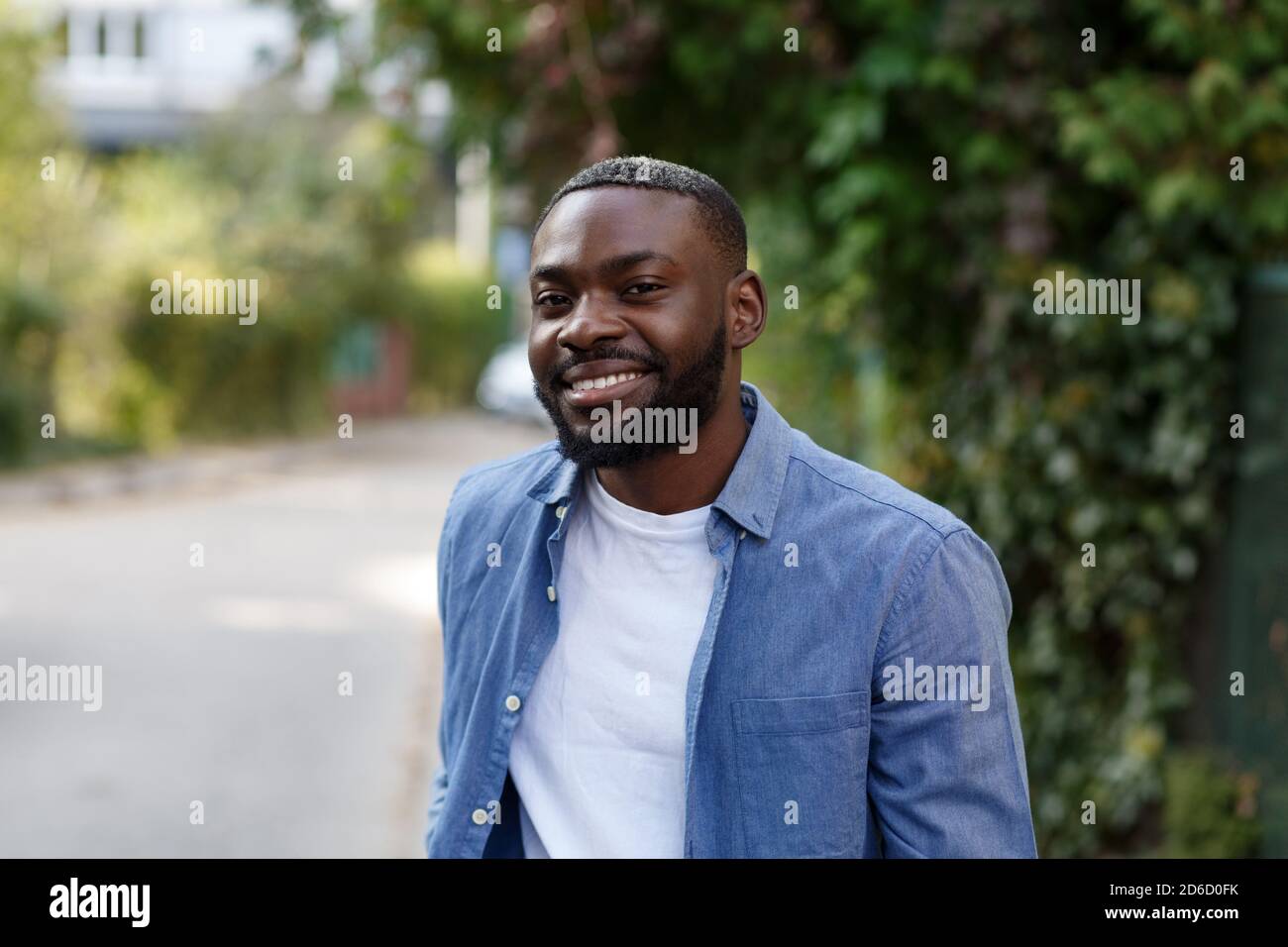 African american man in denim shirt hi-res stock photography and images ...