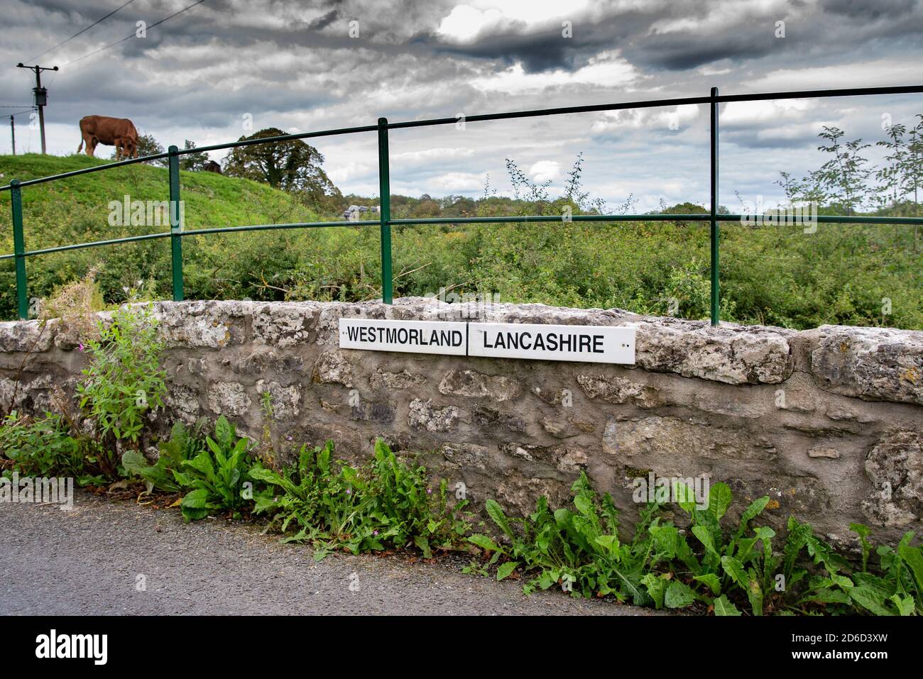 Old Westmorland and Lancashire border sign on Leighton Beck Bridge, near Carnforth, Lancashire UK. Stock Photo