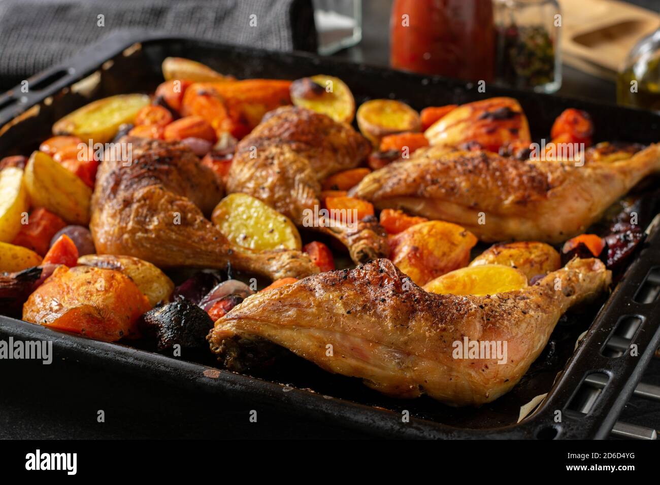 roasted chicken legs with vegetables Stock Photo Alamy