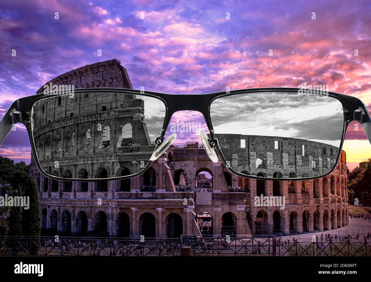 Looking through glasses to bleach Colosseum in Rome at sunset against purple cloudy sky, Italy. Color blindness. World perception during depression. M Stock Photo