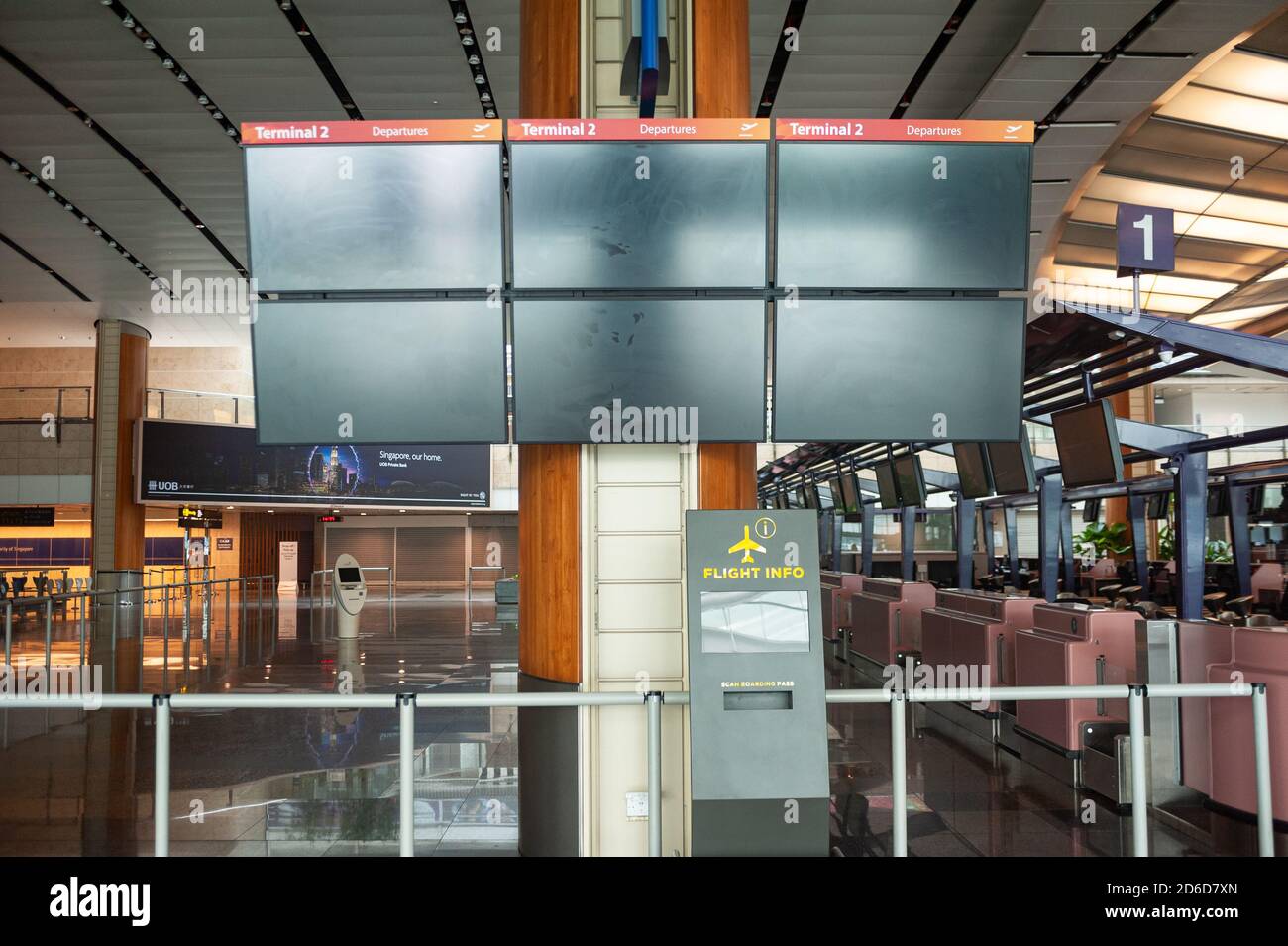 05.08.2020, Singapore, , Singapore - Black screens turned off in the closed and empty departure hall in Terminal 2 at Changi Airport. Due to the globa Stock Photo