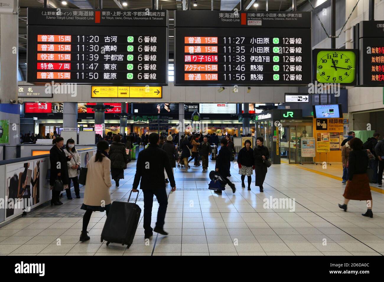 TOKYO, JAPAN - DECEMBER 3, 2016: Passengers hurry in Shinagawa Station in Tokyo. The station was used by 335,661 passengers daily in 2013. Stock Photo