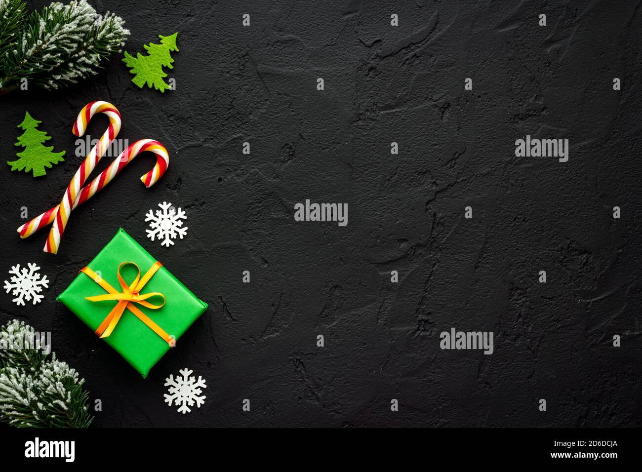 Christmas table layout with gifts and decorations Stock Photo - Alamy