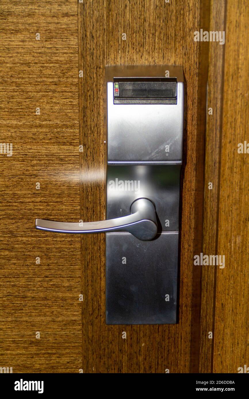 Hotel room door with key card opening system Stock Photo