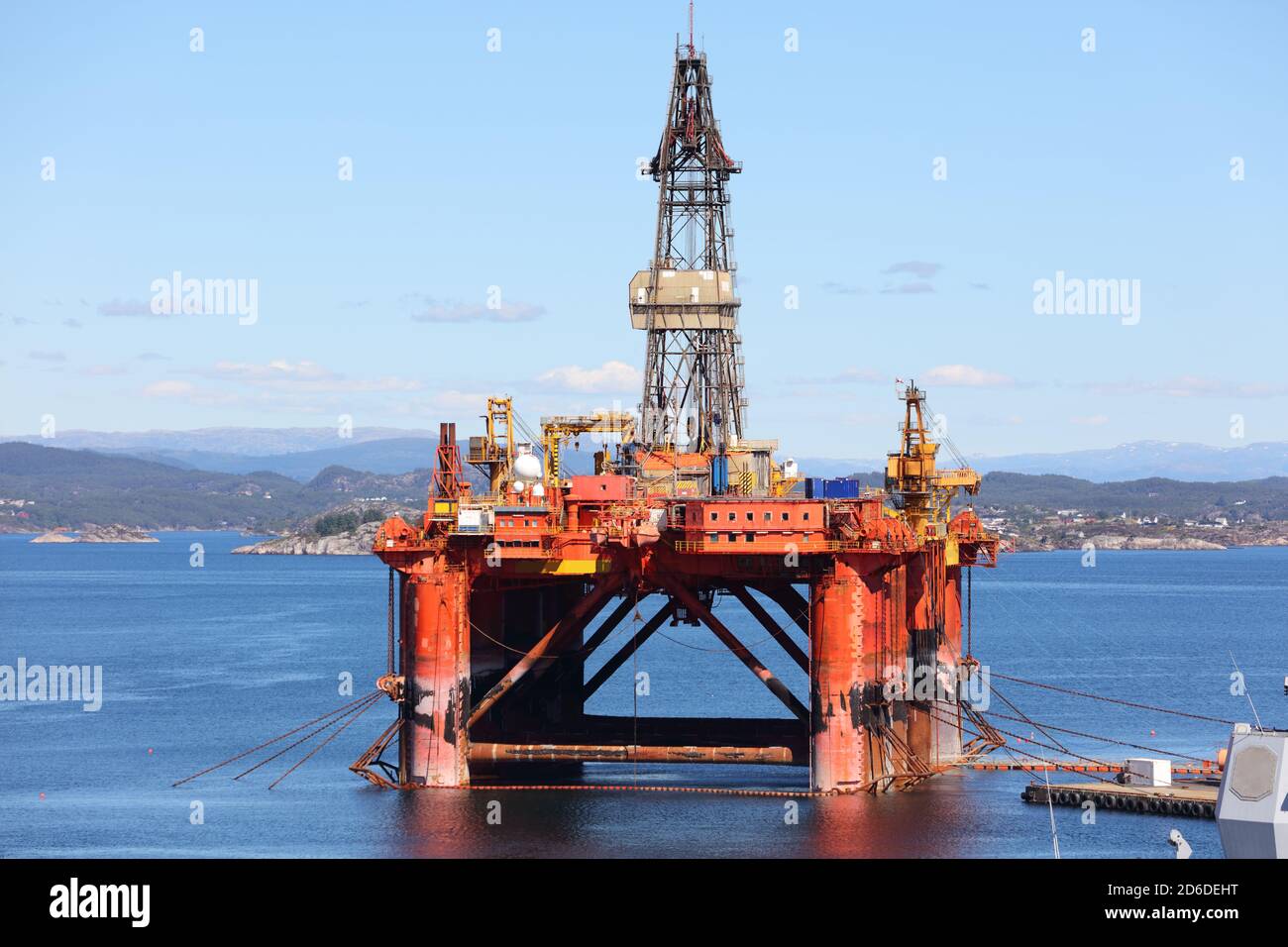 Offshore drilling rig maintenance in a fiord near Bergen, Norway. Oil industry structure. Stock Photo