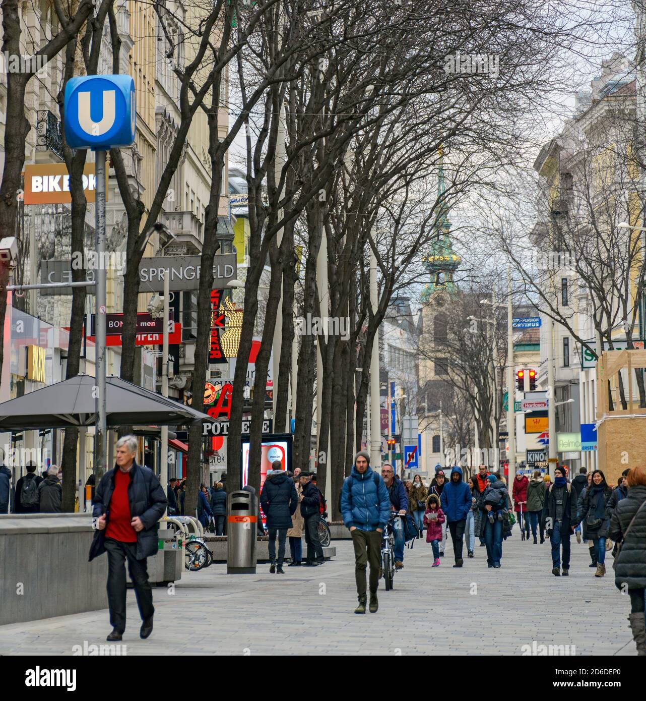 pedestrian zone Mariahilfer street with underground exit in winter in Vienna, Austria Stock Photo