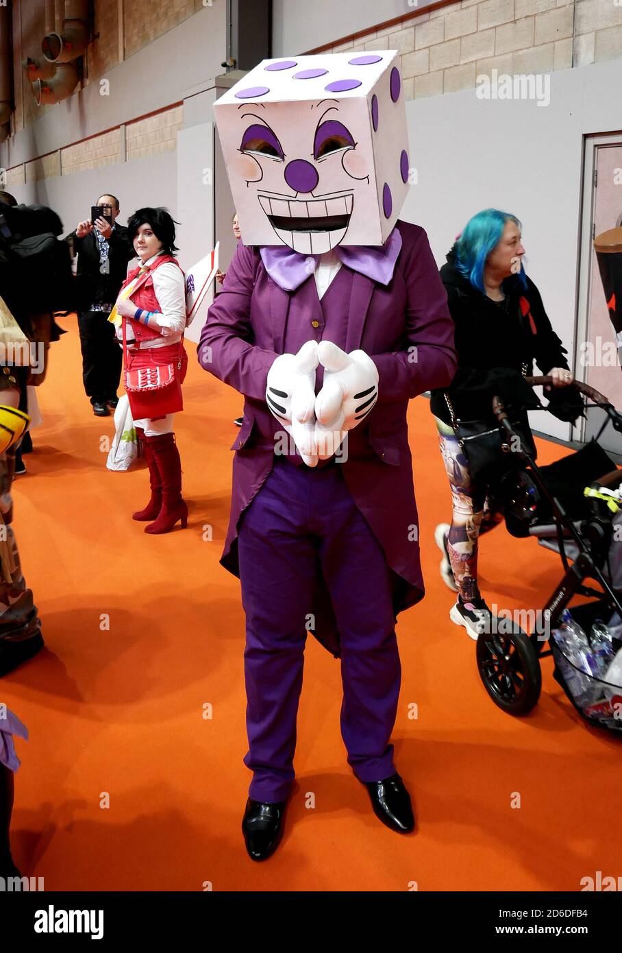 A cosplayer dressed as King Dice from the video games Cuphead