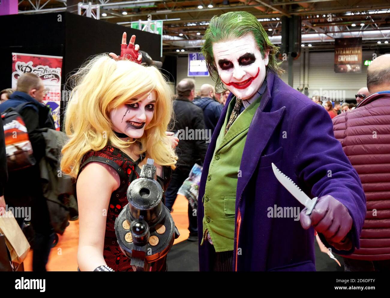 Cosplayers dressed as Harly Quinn and The Joker during the MCM Comic Con held at the NEC Birmingham Stock Photo