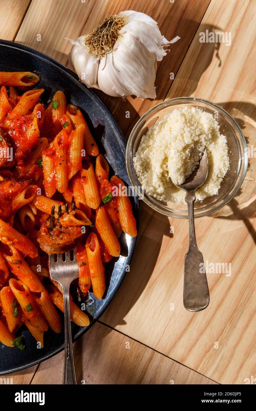 Italian penne pasta in spicy arrabbiata tomato sauce with Italian