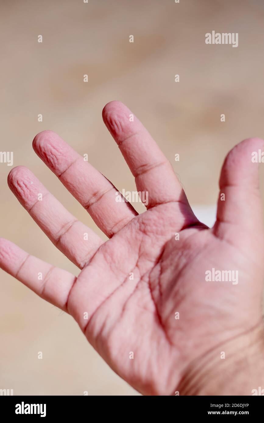 Wrinkled fingers swimming hires stock photography and images Alamy