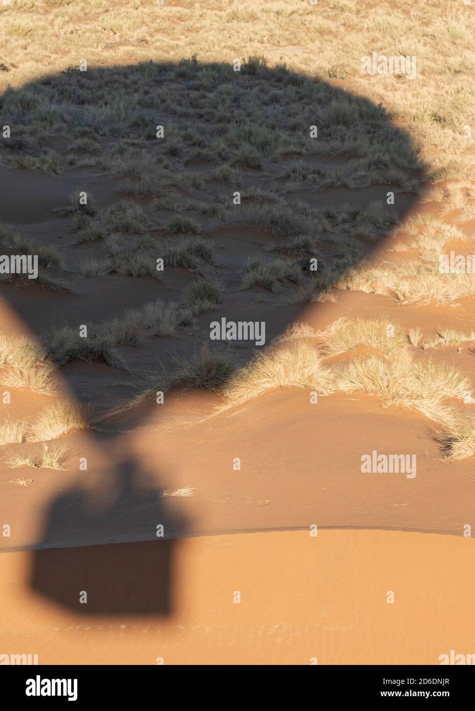 A hot air balloon ride in Namibia. Shadow of the balloon with basket. Stock Photo