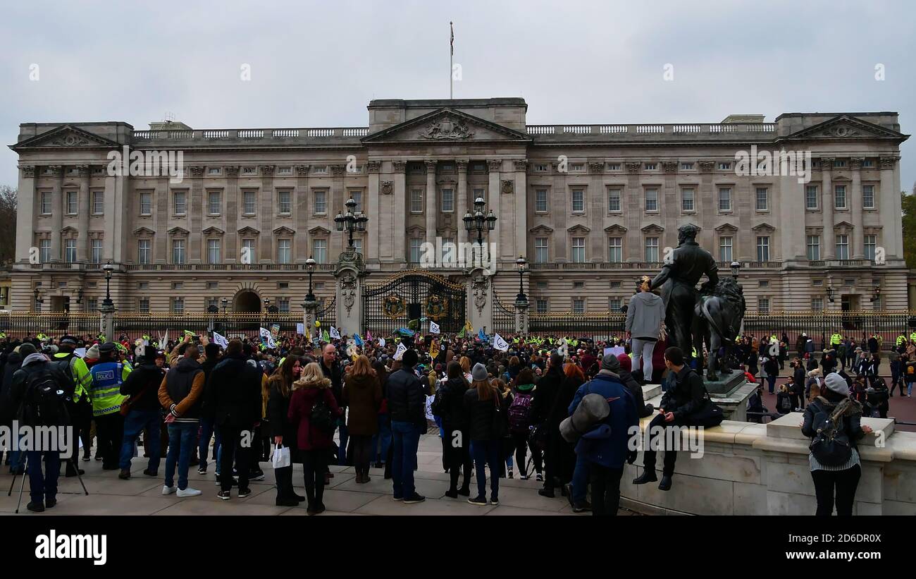 London, UK - 11/24/2018: Activists of global environmental movement Extinction Rebellion (XR) protesting in front of Buckingham Palace. Stock Photo