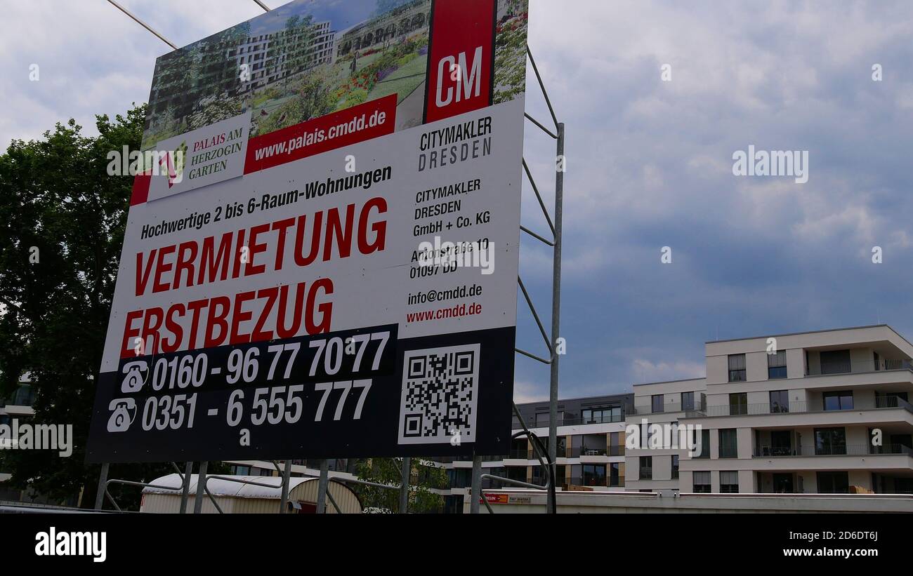 Dresden, Germany - 06/16/2018: Billboard with advertisement of rental apartments for new construction project 'Palais am Herzogin Garten'. Stock Photo
