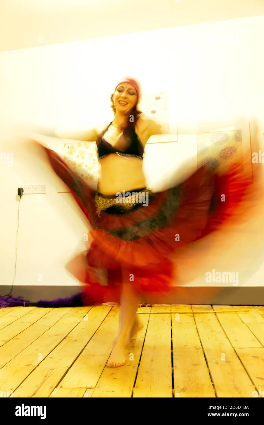 Belly Dancer and Artist Sara Paganetto  performing upstairs at Ruby & Norm 266-268 Lee High Road, Lewisham, London Stock Photo