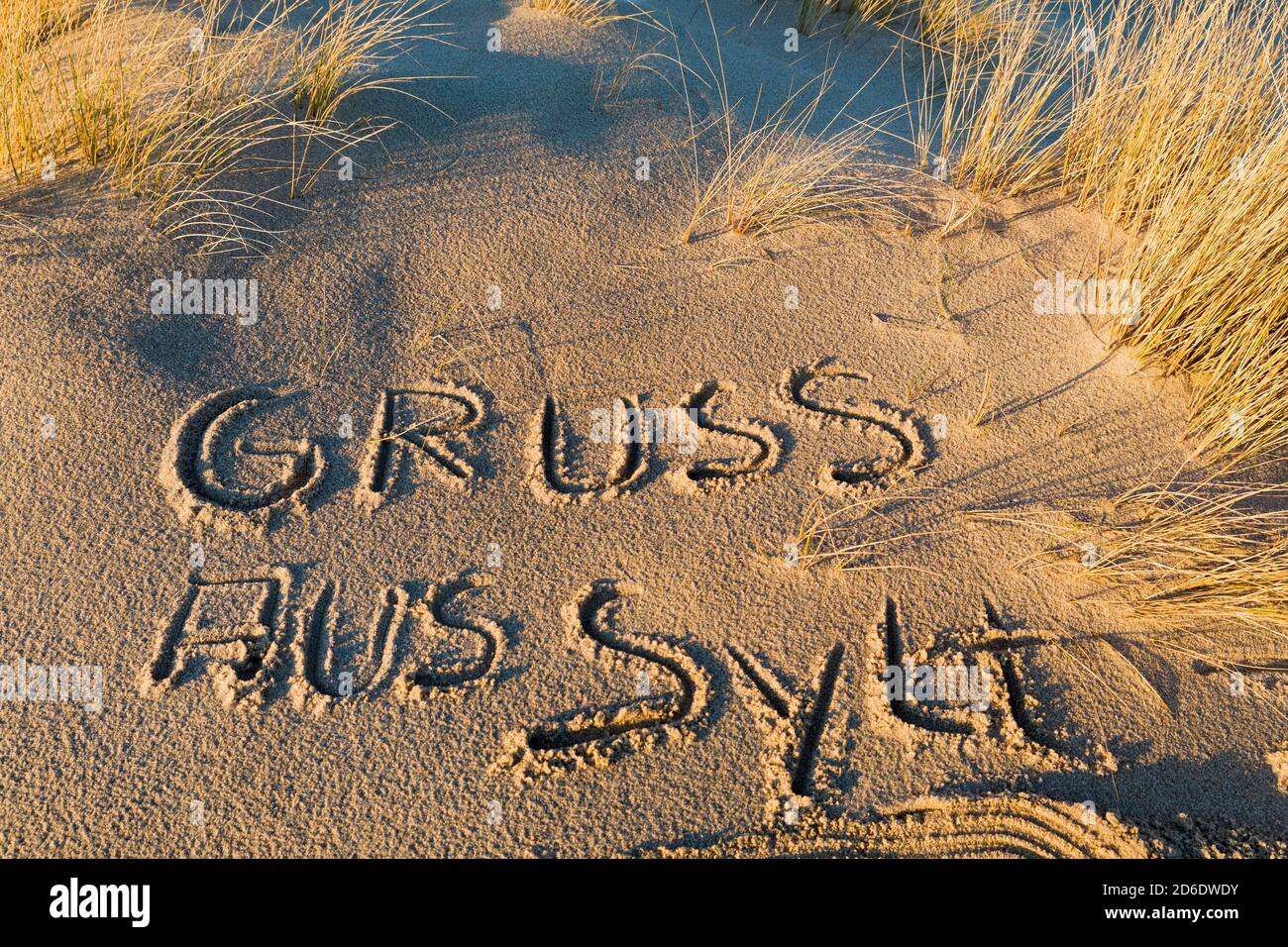 Beach, sand, lettering, greetings from Sylt Stock Photo - Alamy