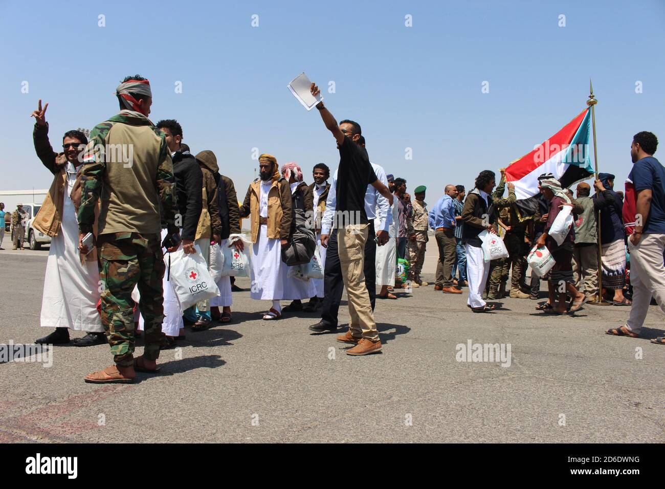 Aden, Yemen. 16th Oct, 2020. Yemeni prisoners who were held by Houthi are seen upon their arrival at an airport in the southern city of Aden, after being released on the second day of a prisoner swap between the Yemeni government and the Houthi movement. More than 1,000 people detained in relation to the conflict in Yemen are to be transported back to their region of origin or to their home countries by The International Committee of the Red Cross (ICRC) in the largest operation of its kind during the five-and-a-half-year war. Credit: Wail Shaif/dpa/Alamy Live News Stock Photo