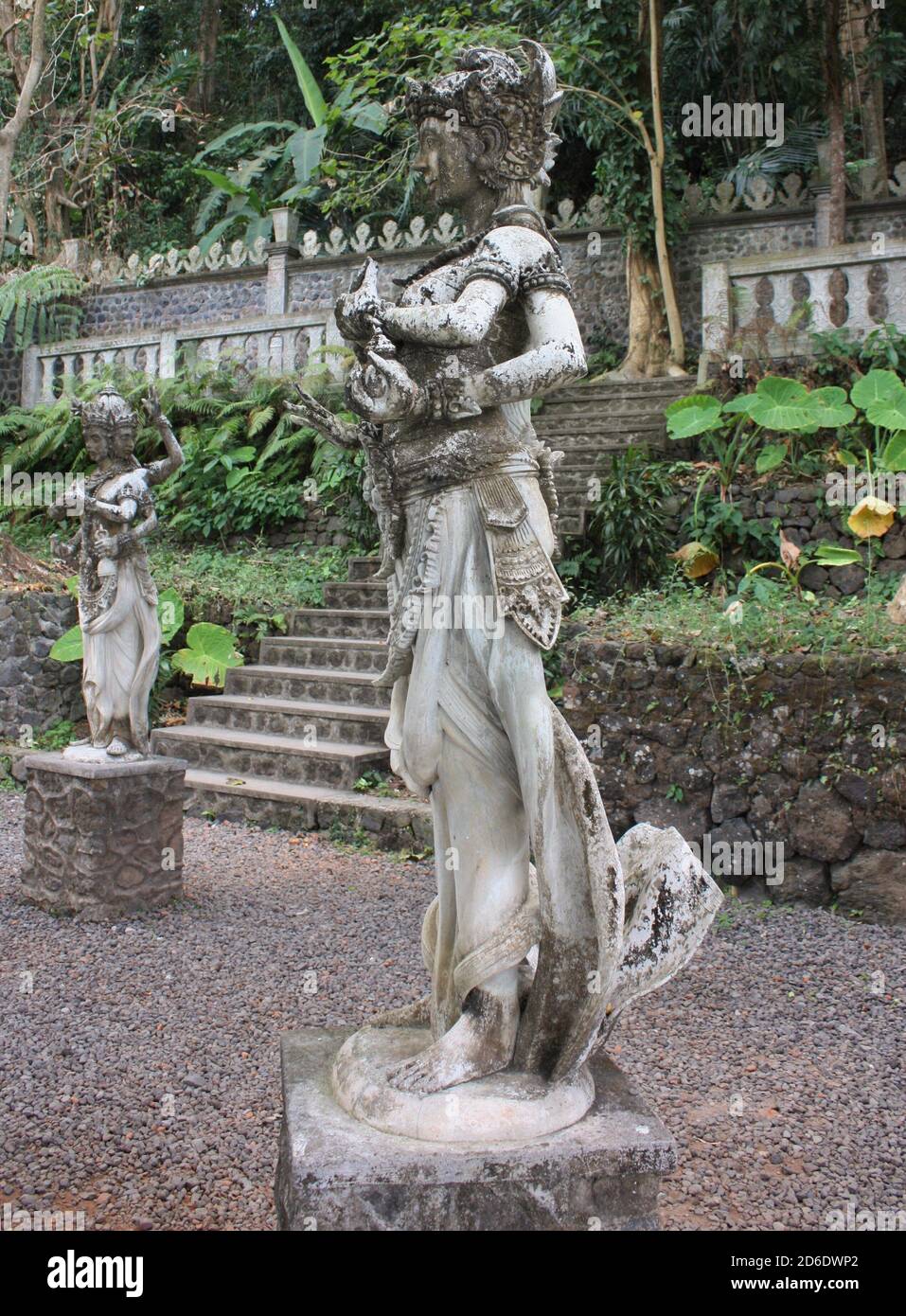 Balinese Stone statues in a scenic outdoor garden in Bali, Indonesia Stock  Photo - Alamy