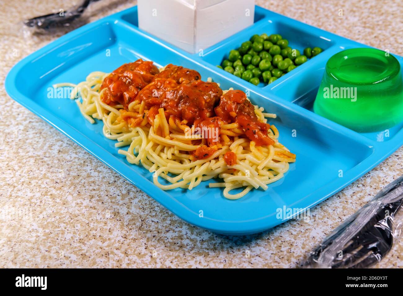 grade-school-lunch-tray-of-italian-spaghetti-and-meatballs-with-green