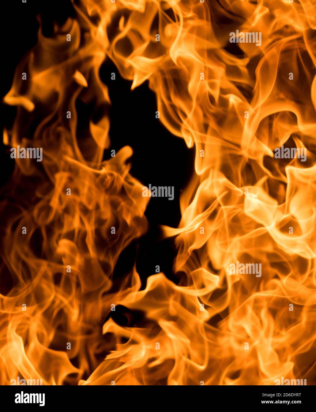 Closeup of bright flames of fire on black background Stock Photo - Alamy