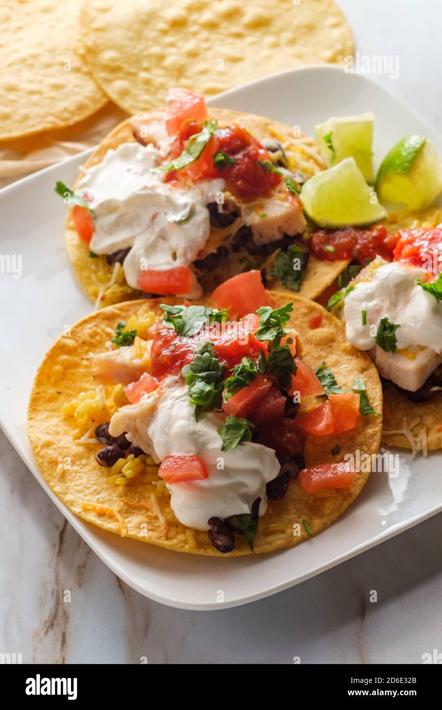 Tostada with beans cheese and cream hires stock photography and images