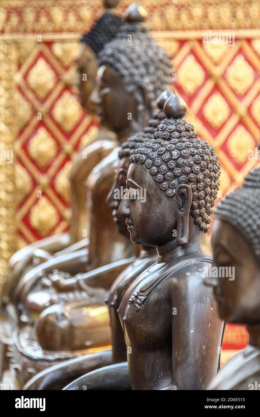 Buddha statues in a temple in Thailand Stock Photo - Alamy