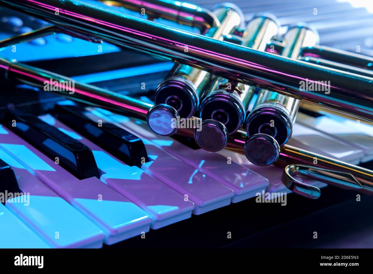 Old and worn Jazz trumpet and piano keyboard musical show and