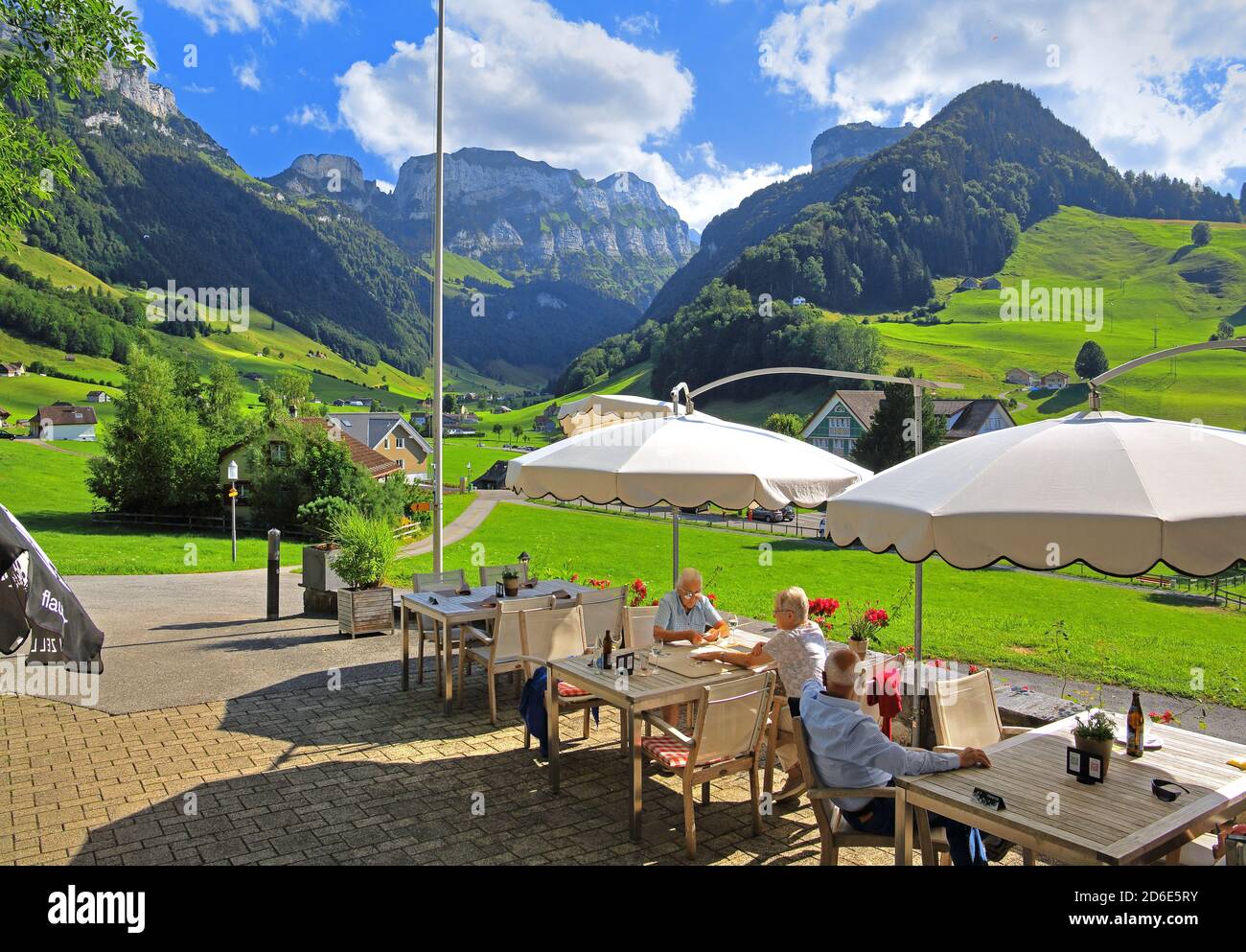 Restaurant terrace of the mountain inn Frohe Aussicht against the Alpstein Mountains with the Ebenalp, Schwende, Appenzell Alps, Appenzeller Land, Canton of Appenzell-Innerrhoden, Switzerland Stock Photo