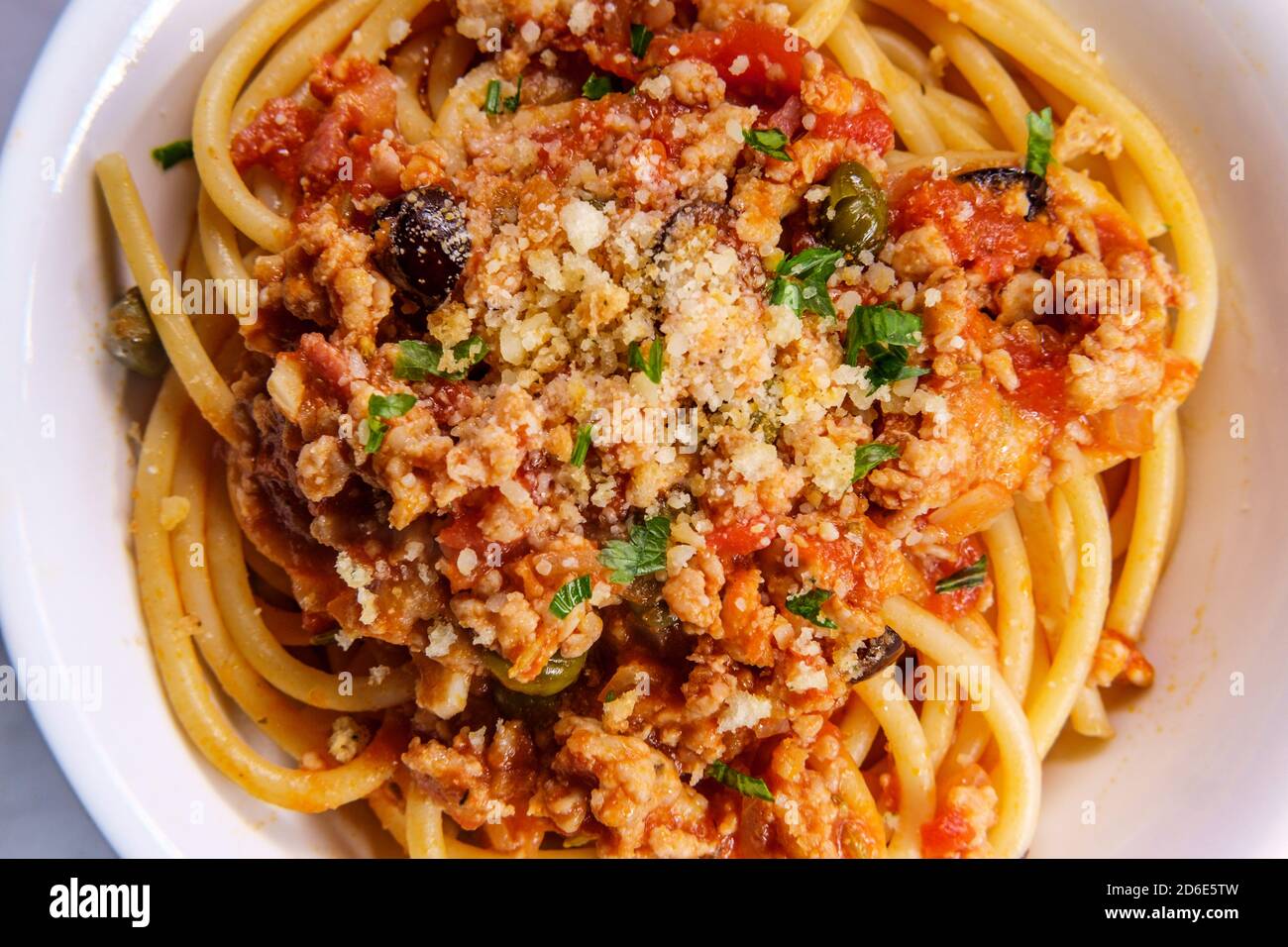 Bucatini Italian ragu alla Bolognese sauce with sausage and toasted