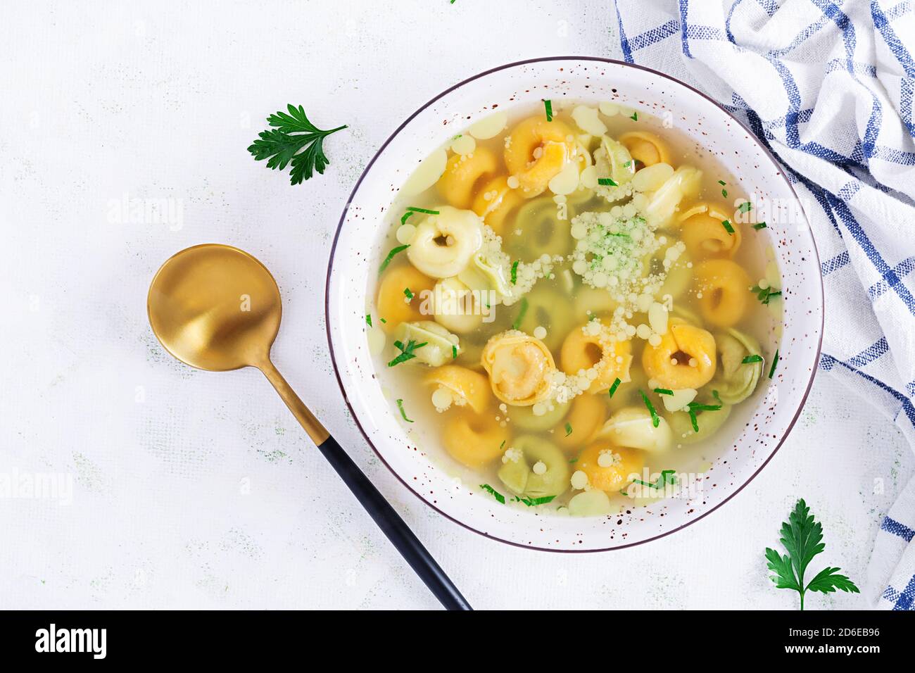 Tortellini in broth, italian traditional dish. Italian pasta. Top view