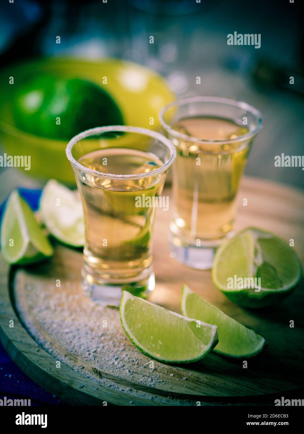 Tequila shots with wedges of lime and salt Stock Photo Alamy