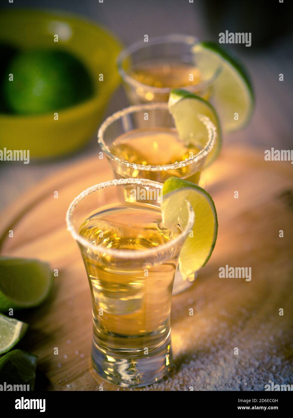 Tequila shots with wedges of lime and salt Stock Photo Alamy