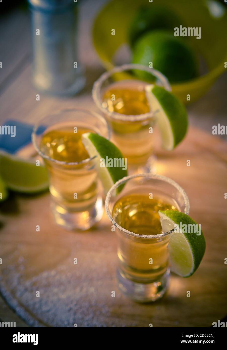 Tequila shots with wedges of lime and salt Stock Photo - Alamy