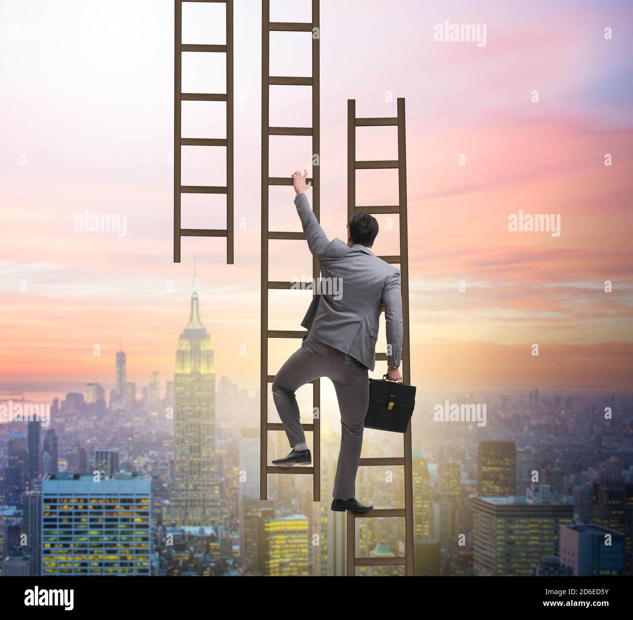 The businessman climbing career ladder in business concept Stock Photo ...