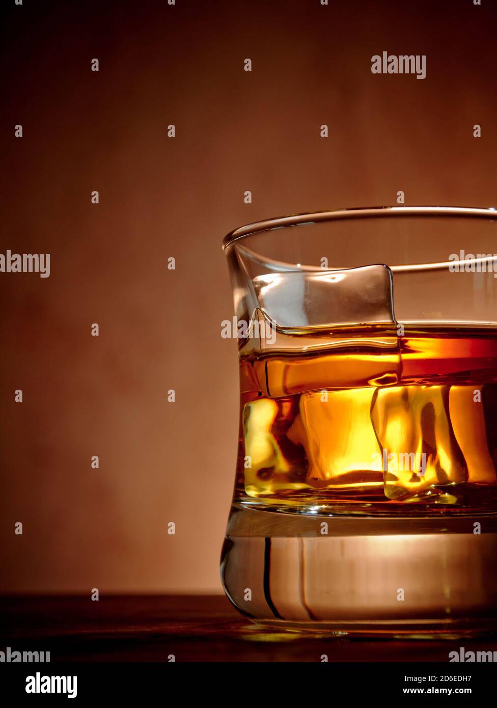 Glass of whiskey on the rocks Stock Photo - Alamy